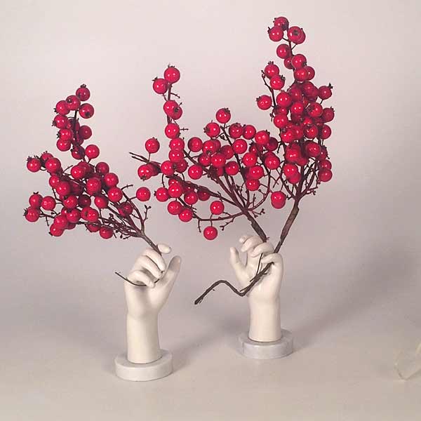 A pair of marble mounted mannequin hands.